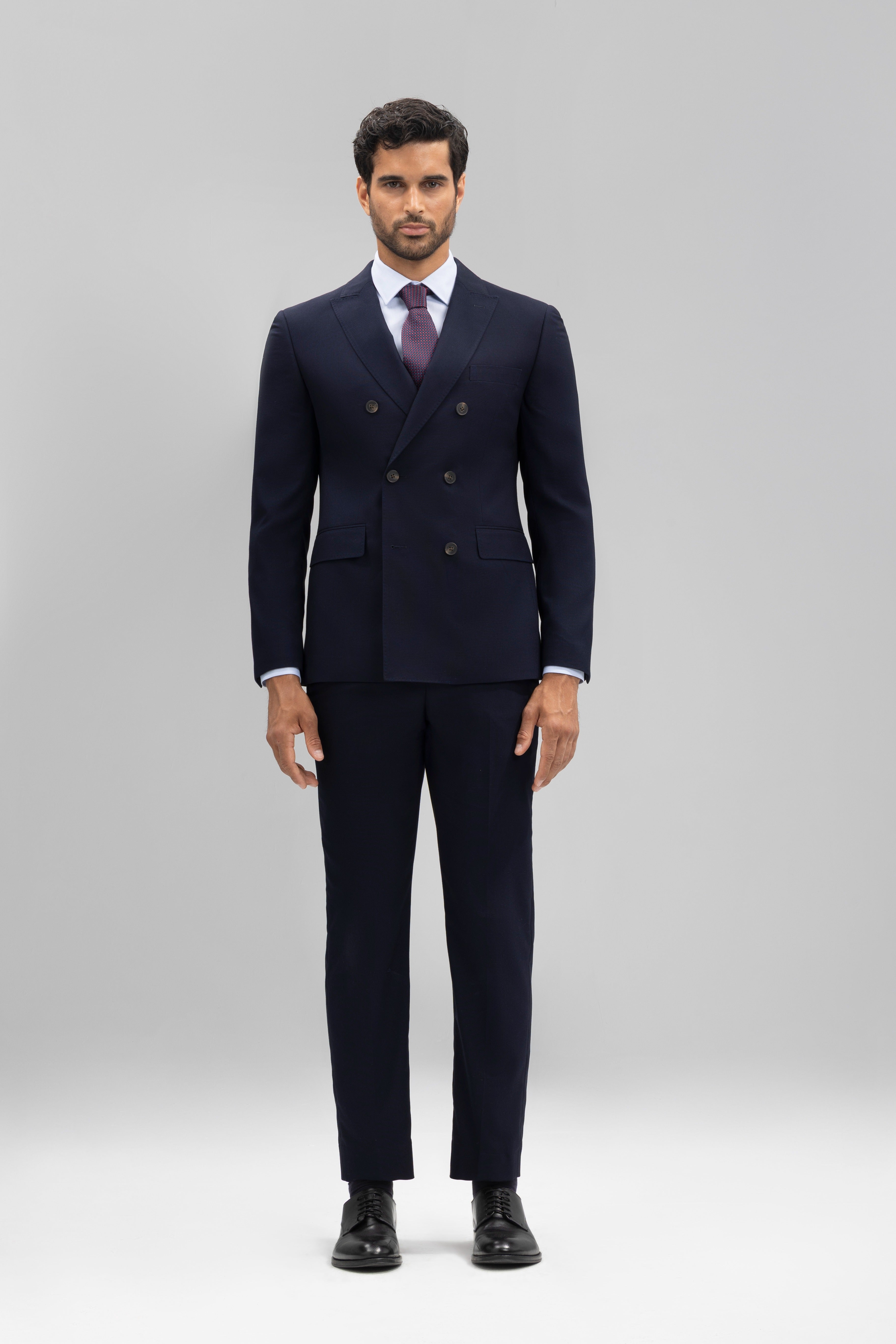 Pantalón traje slim fit falso liso