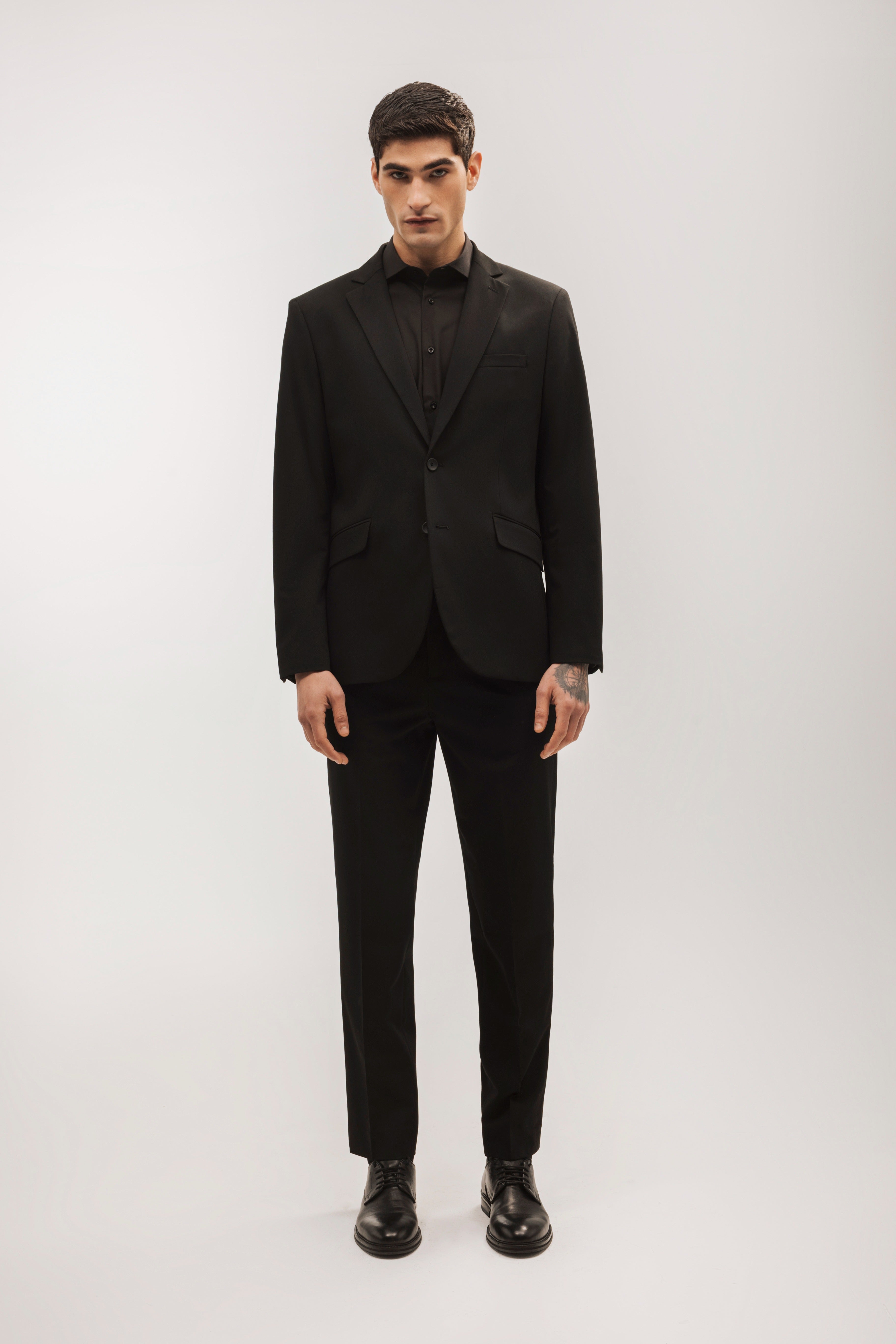 Pantalón traje slim fit liso