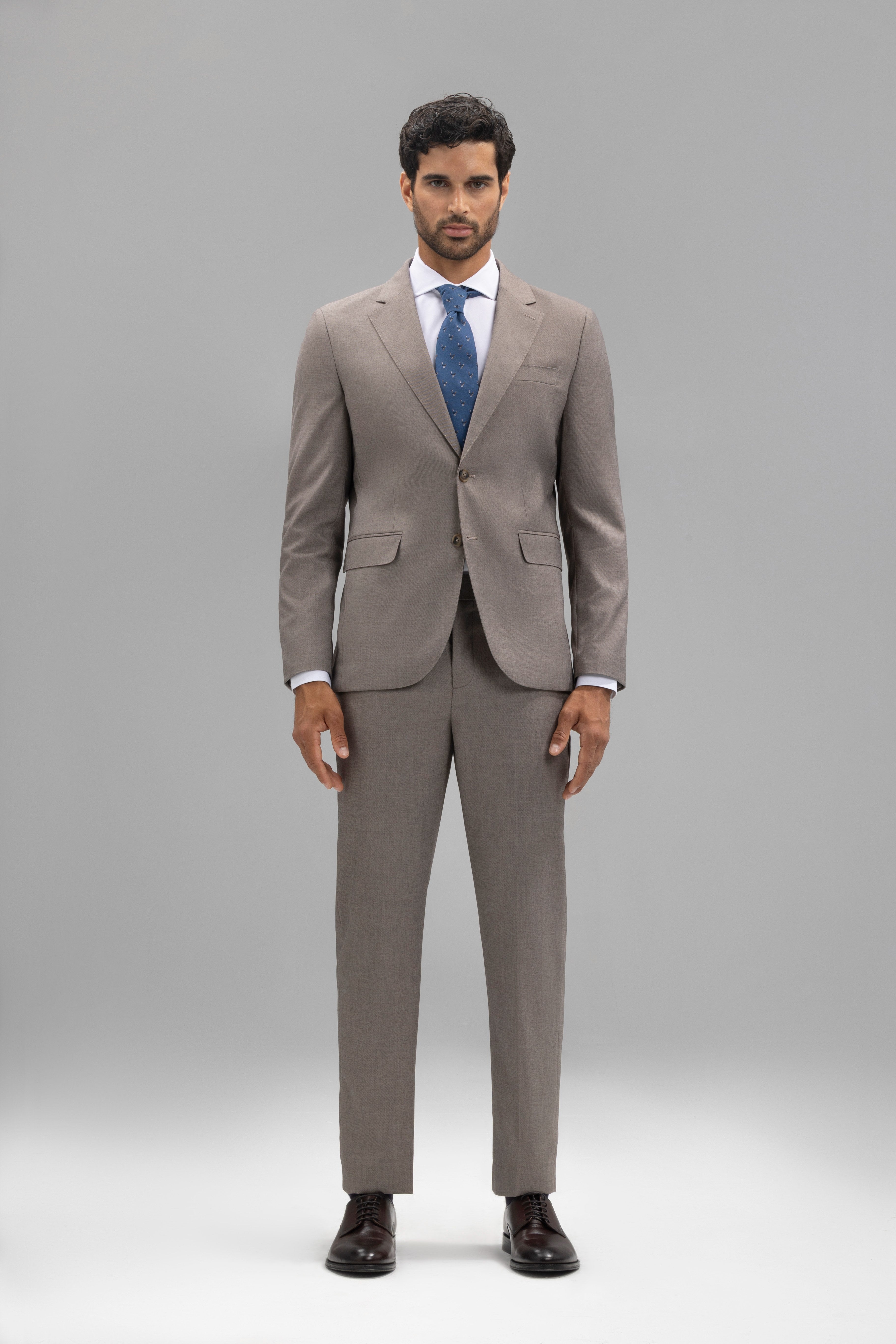 Pantalón traje slim fit falso liso