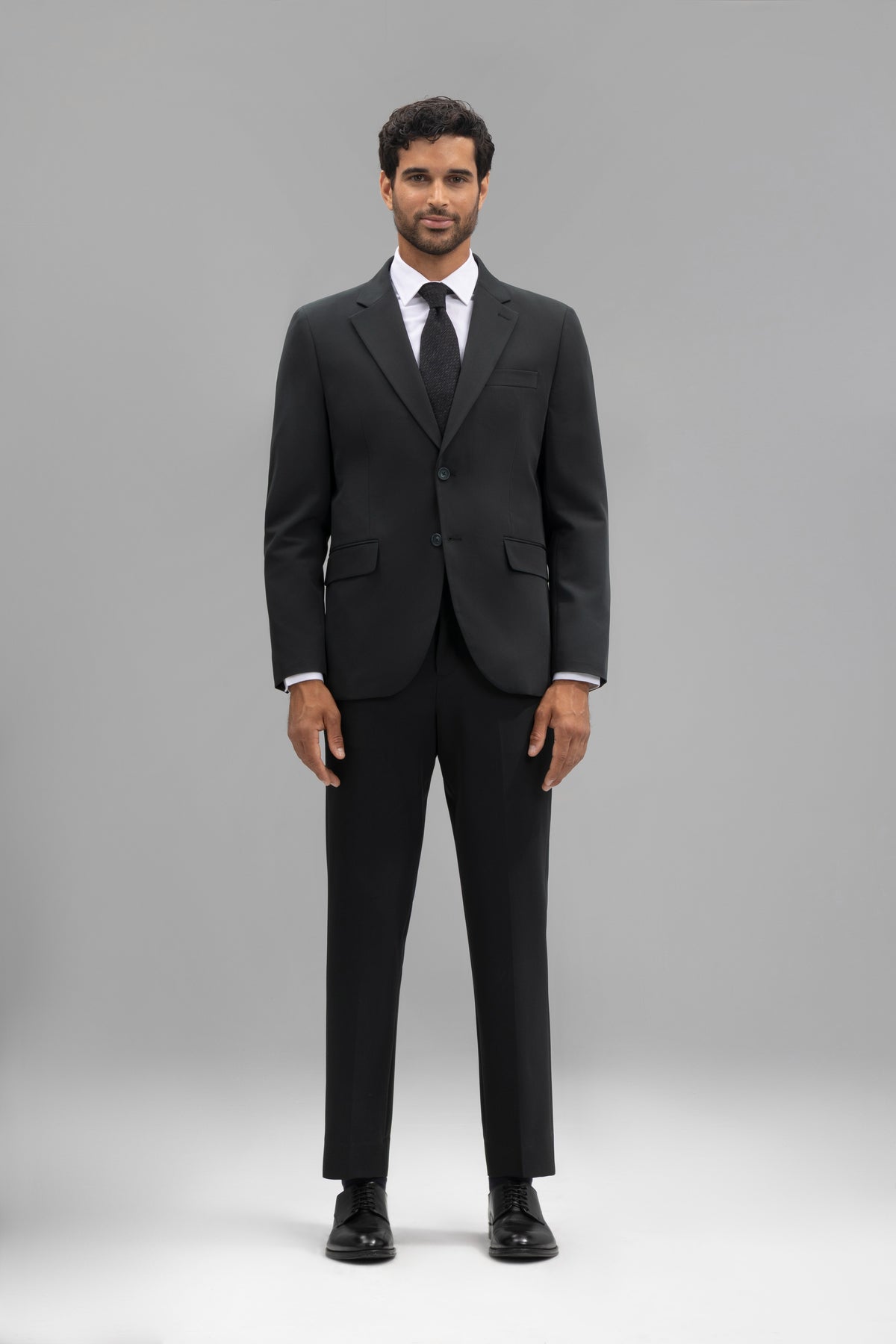 Pantalón traje slim fit liso