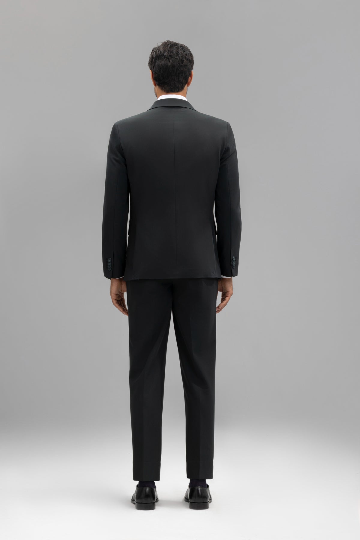 Pantalón traje slim fit liso