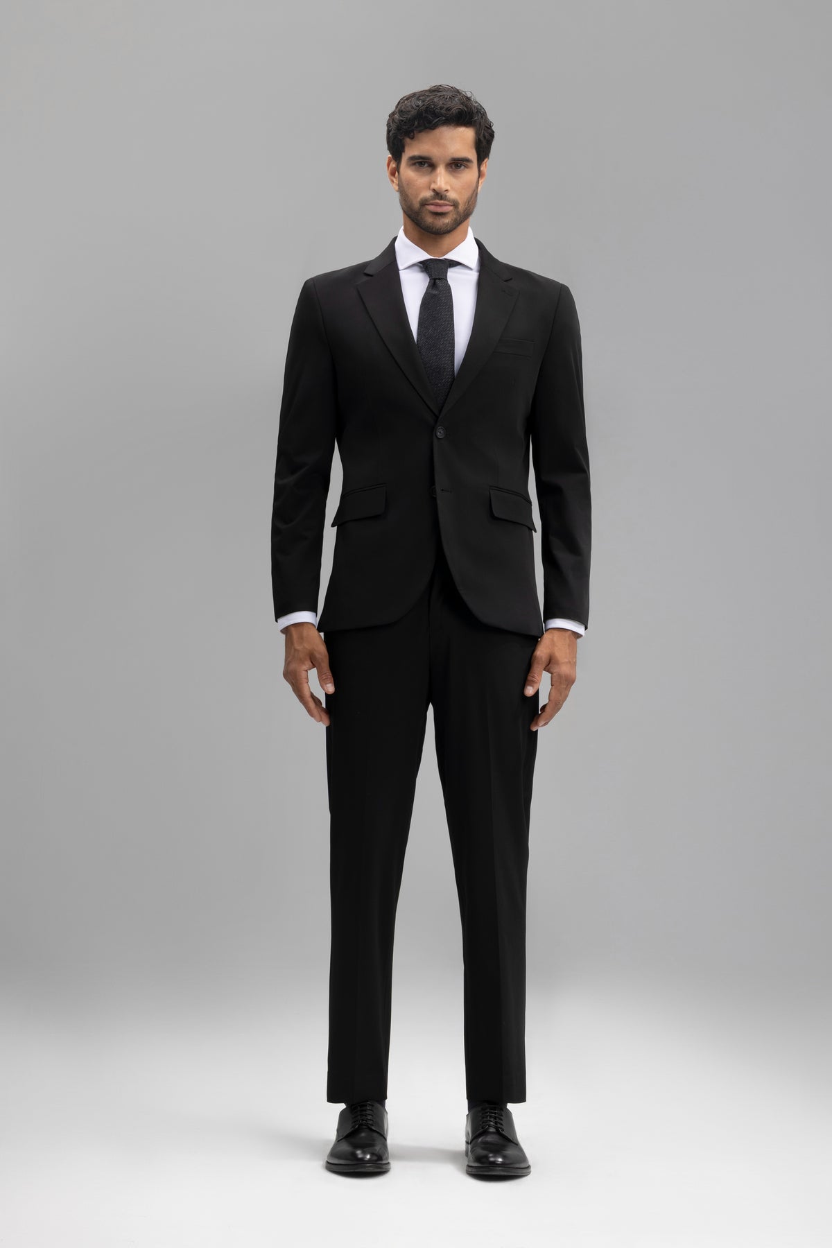 Pantalón traje slim fit liso