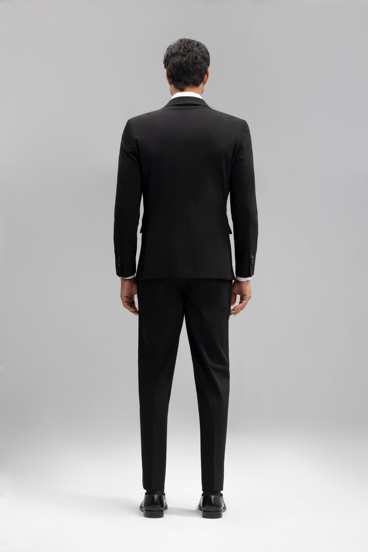 Pantalón traje slim fit liso