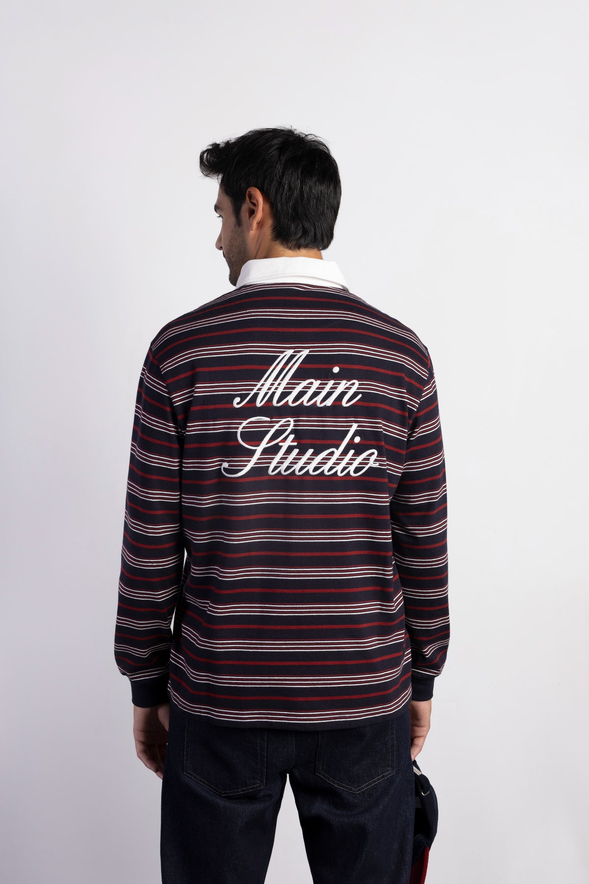 Polo relaxed fit rayas bordado