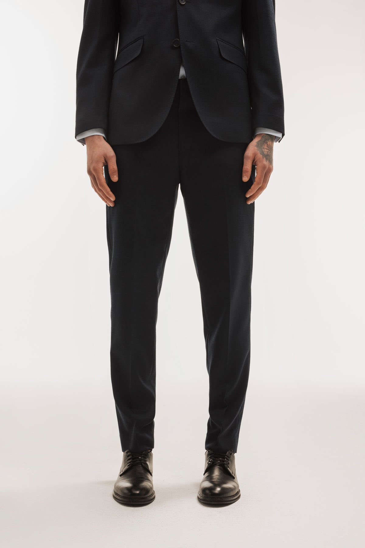 Pantalón traje lana slim fit falso liso